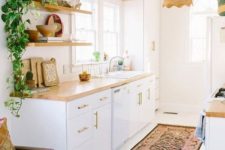 08 give your kitchen a boho feel using boho rugs, pillows, towels, greenery and wicker touches