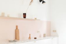 10 a blush kitchen backsplash adds a subtle touch of color to the neutral space