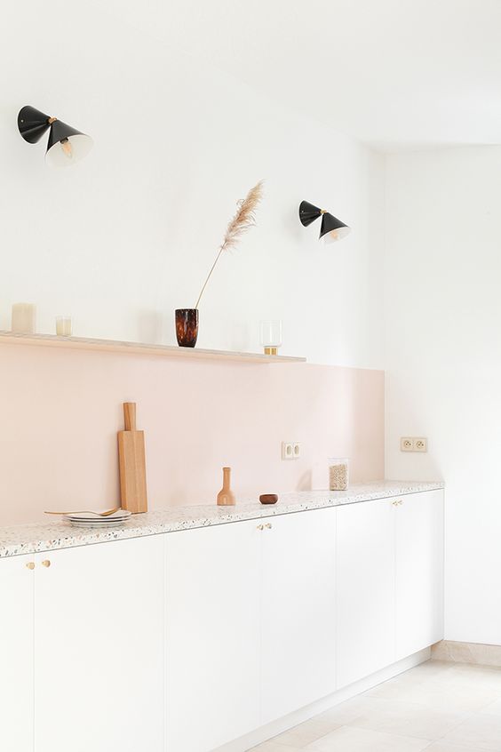a blush kitchen backsplash adds a subtle touch of color to the neutral space