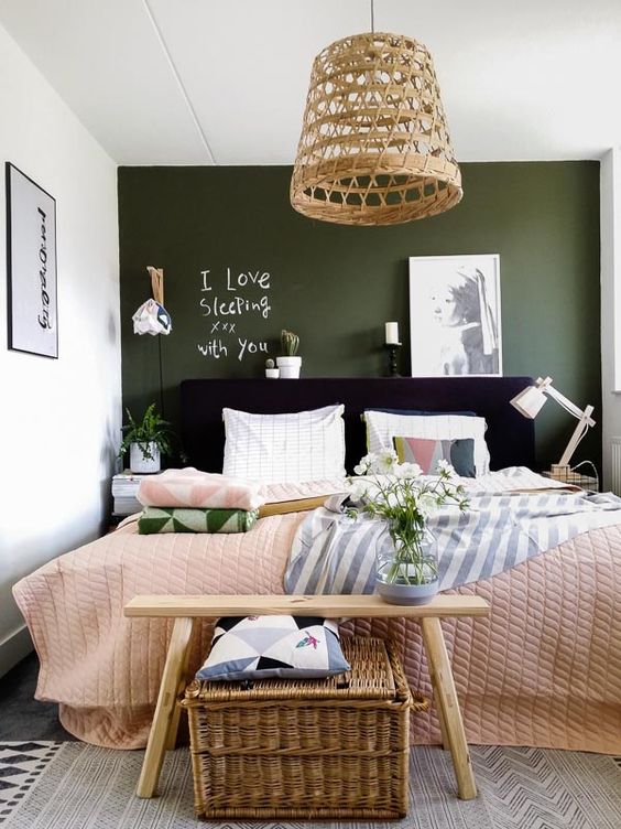 A dark green chalkboard wall makes the space more interesting and allows chalking on it