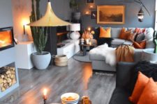 10 a space done in grey shades and enlivened with bold orange touches in each corner