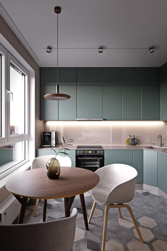 soft grey tones as dominant ones and an olive green kitchen for a soft and chic space