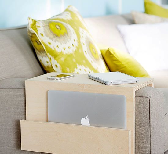 a minimalist plywood sofa caddy with a pocket for gadgets is a great piece for any living room