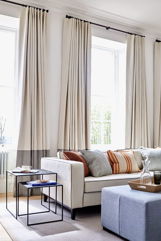a bold and modern idea is color block curtains in two contrasting shades that are sure to add chic