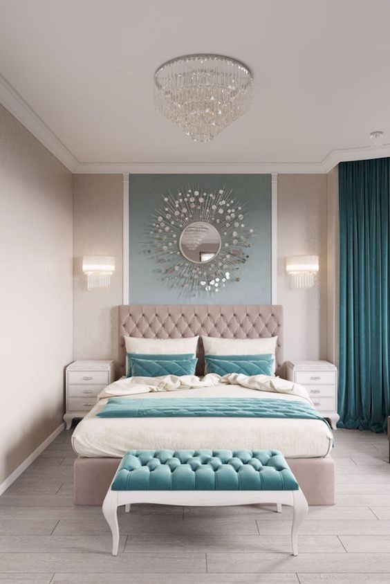 a glam and relaxing bedroom with grey and teal as two main opposing colors