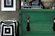 15 a bold green dresser with metal and tassel handles for a boho feel
