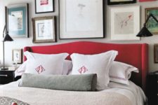 15 a grey bedroom spruced up with lots of artworks and a red upholstered bed