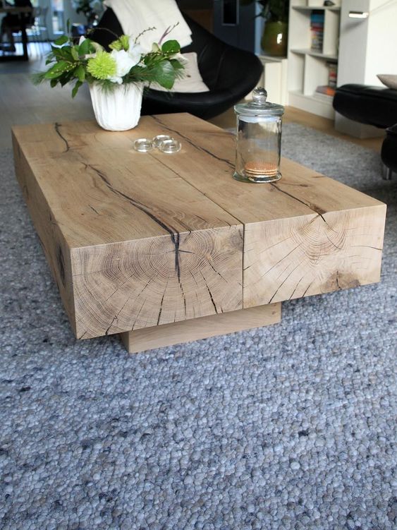 add a touch of nature to your living room with such a low wooden coffee table