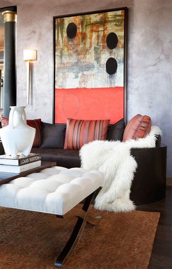 a bold artwork is a must for the plain walls of your living room, it can be oversized
