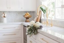 16 add a touch of glam to a usual plain kitchen rocking gold handles and fixtures