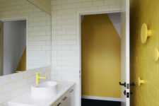 17 neon yellow grout, fixtures and an accent tile wall with wall hooks, all in yellow