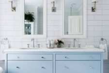 18 a powder blue double vanity with silver touches creates a romantic coastal feel in the bathroom
