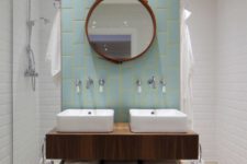 18 a vanity highlighted with blue tiles and neon yellow grout in between adds a colorful touch
