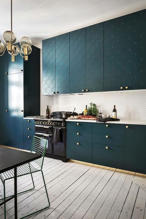accent your kitchen cabinets and their color with brass knobs to add a touch of glam and chic