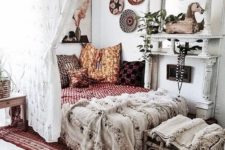 18 boho textiles, fringe, colorful baskets on the wall and alace curtain for an ultimate boho look
