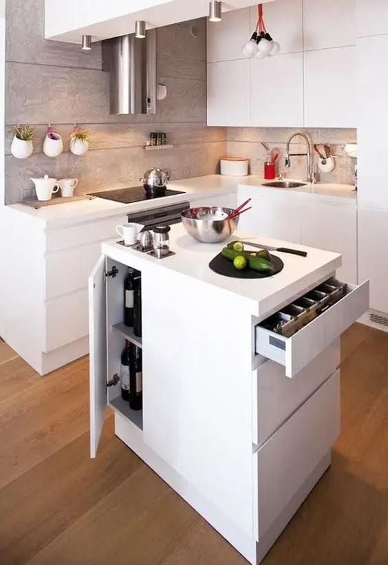 a small minimalist kitchen island with much storage space inside and a cooktop