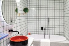 19 emerald grout and a painted half wall and a ceiling for a trendy and colorful bathroom