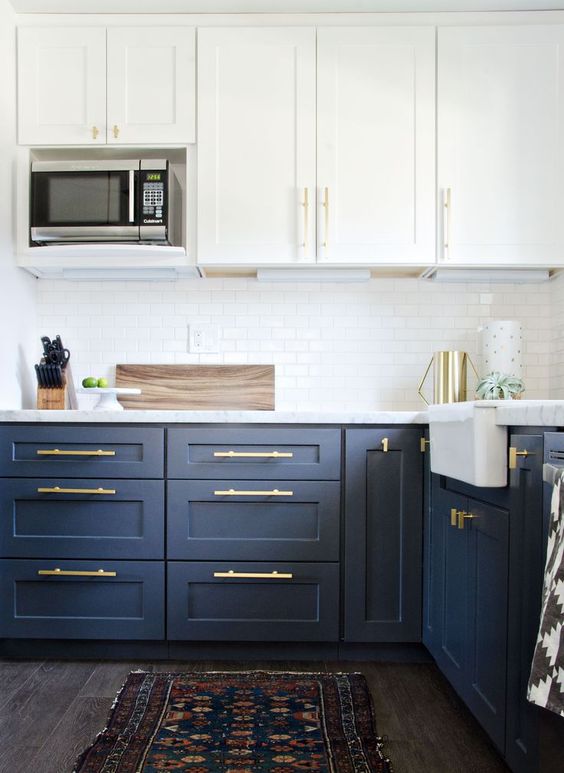 unify the cabinet look using the same brass handles and make a cool glam accent with them