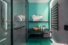 20 The kids’ bathroom is done in black, white and bright turquoise to make it more welcomign for kids yet cheerful