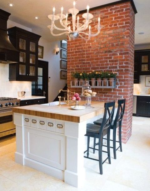 a large kitchen island that doubles as a dining space and save a lot of space in the kitchen