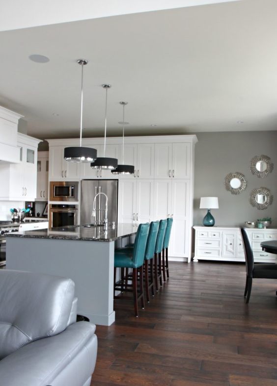 touches of teal is a chic idea for a grey and white space and a bold color splash