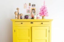 21 a bright yellow cabinet is a nice idea to add color and make an accent