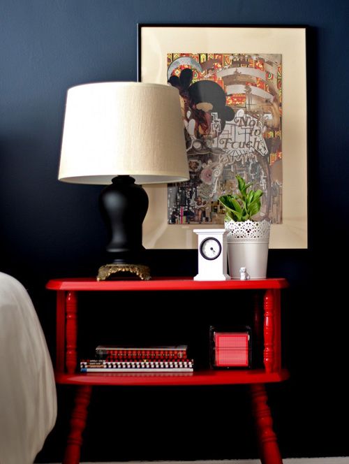 a vintage farmhouse nightstand painted red is a simple idea to add color to your space