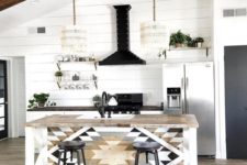 23 macrame lampshades, a mosaic kitchen island and wooden beams for a relaxed modern boho look