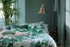 24 a muted green bedroom and a bright green bedding set with a botanical print for maximal relaxation