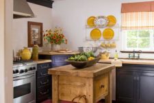 24 a vintage rustic kitchen with a massive wooden island with a drawer and open storage