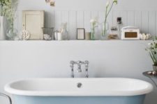 25 a vintage pale blue clawfoot bathtub will become a base for your refined bathroom