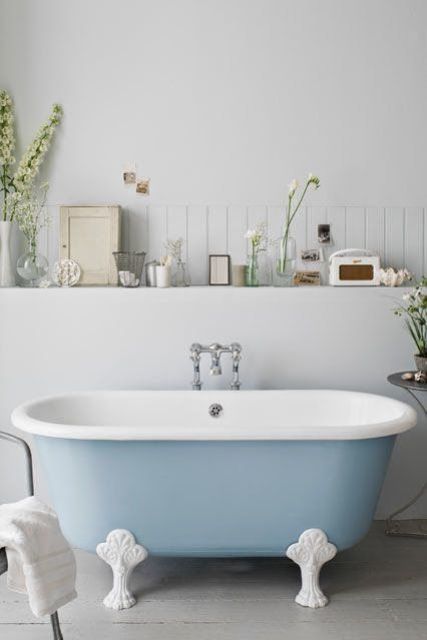 a vintage pale blue clawfoot bathtub will become a base for your refined bathroom