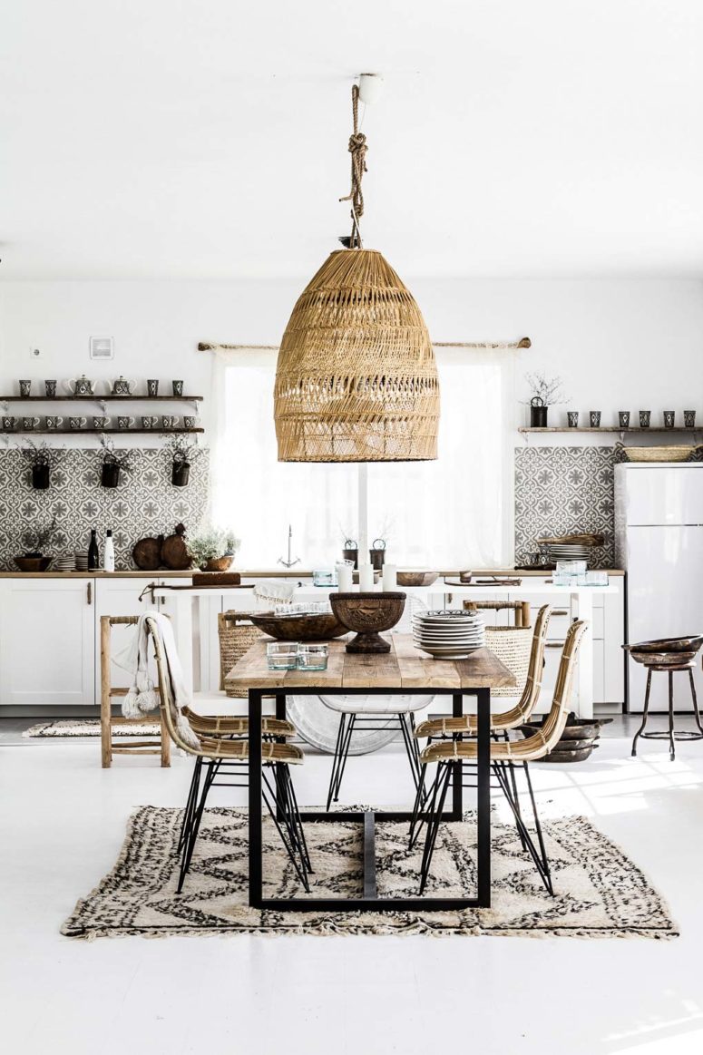 mosaic tiles, a boho rug, a wicker lampshade and chairs for a boho desert retreat