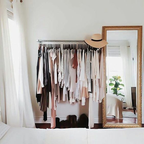a makeshift closet is a popular idea, which is great for small space to keep them airy