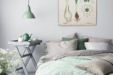 26 pastel green bedding and a pendant lamp for bringing freshness to the space