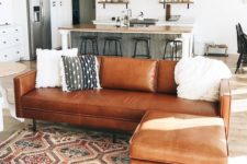 26 wooden and leather touches of similar touches warm up and cozy up the layout
