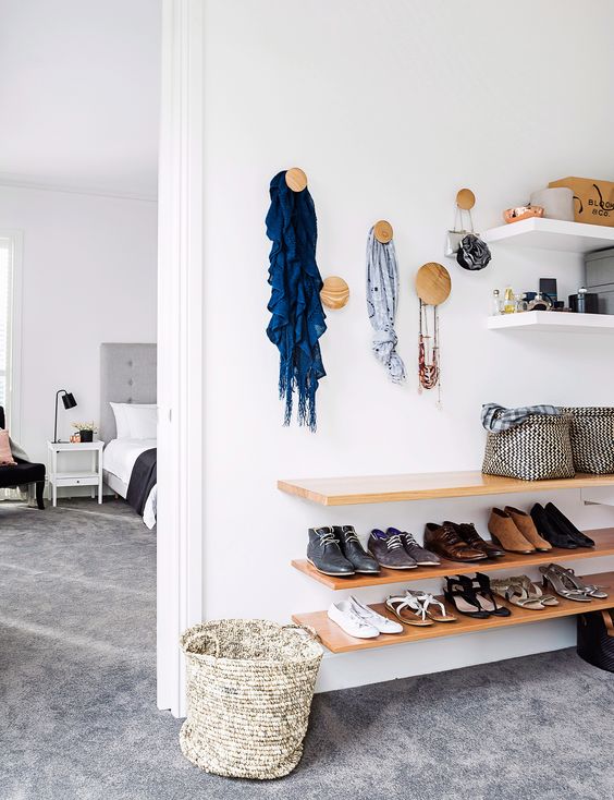 attach some wall shelves and stylish hooks to organize your clothes and accessories
