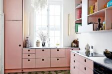 a bright pink kitchen with MDF cabinetry, a white countertop and a backsplash, upper open storage cabinets