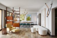 01 This gorgeous large apartment is done in a mix of art deco and mid-century modern styles and reflects the Riviera lifestyle