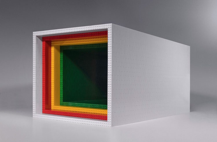 This is a LEGO coffee table with a white cover and colorful edges inside, which allows it to blend with many spaces