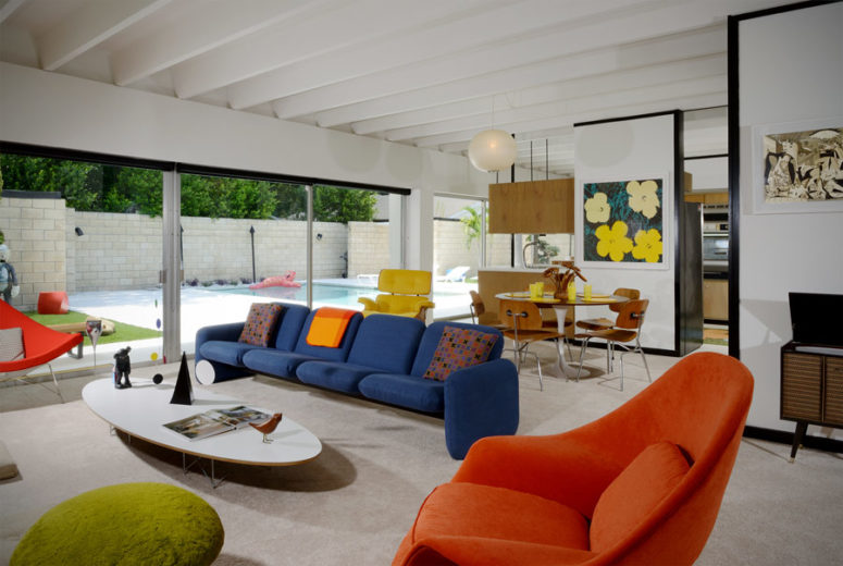 This mid-century modern house is a neutral space done with colorful furniture and textures