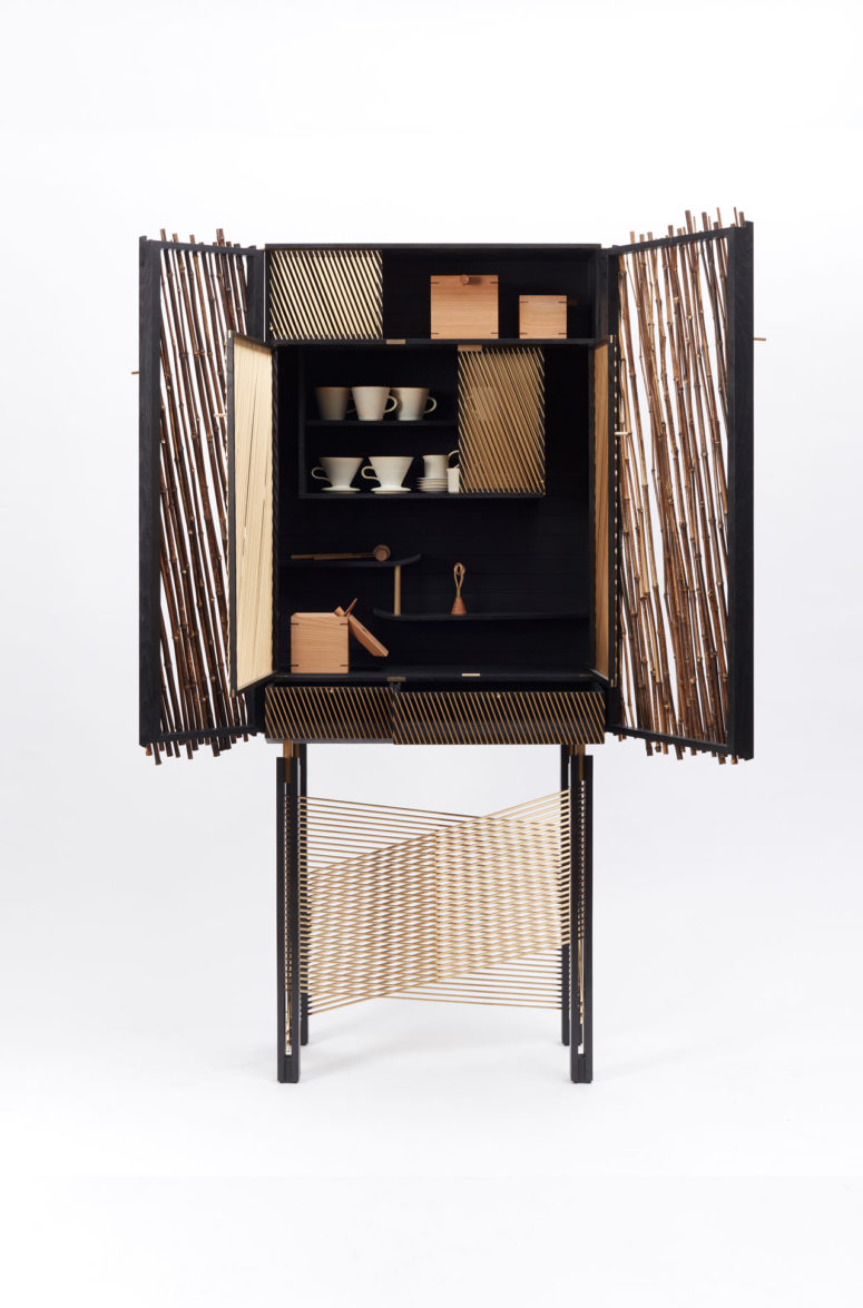 The cabinet combines Japanese bamboo, wood stained with Japanese calligraphy ink
