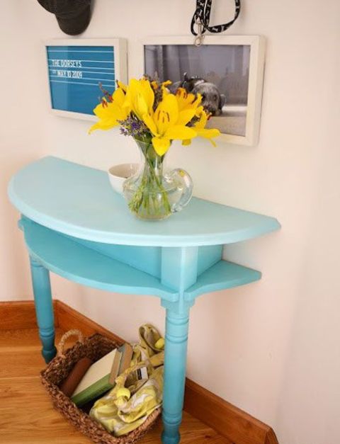 a half cut table painted bold is the best idea for a small entryway where you need a console