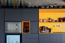 02 a navy kitchen with yellow compartments is color block piece itself and is a bold statement