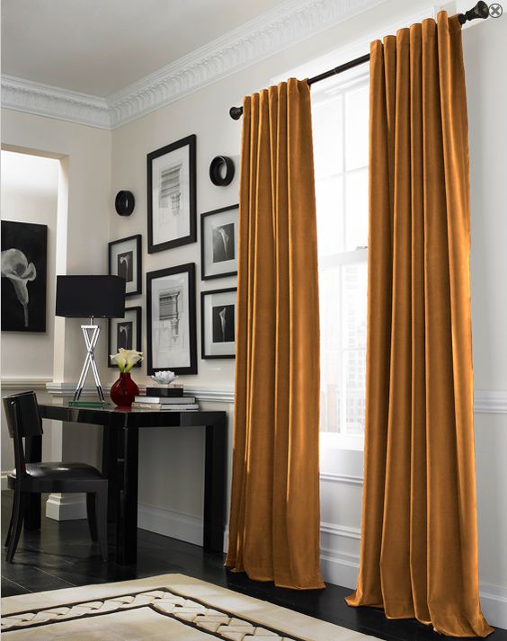 velvet curtains in mustard color is a cool touch to your bedroom and will keep the cold away