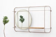 03 Encased in a steel frame, the Margin mirror has a round shape with a slight gradient