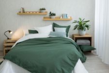 03 If you like bold colors, try a white and emeralf bedding set with a contrast