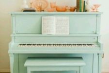 03 paint your piano some cool color, like mint here, and display some colorful glassware and lamps