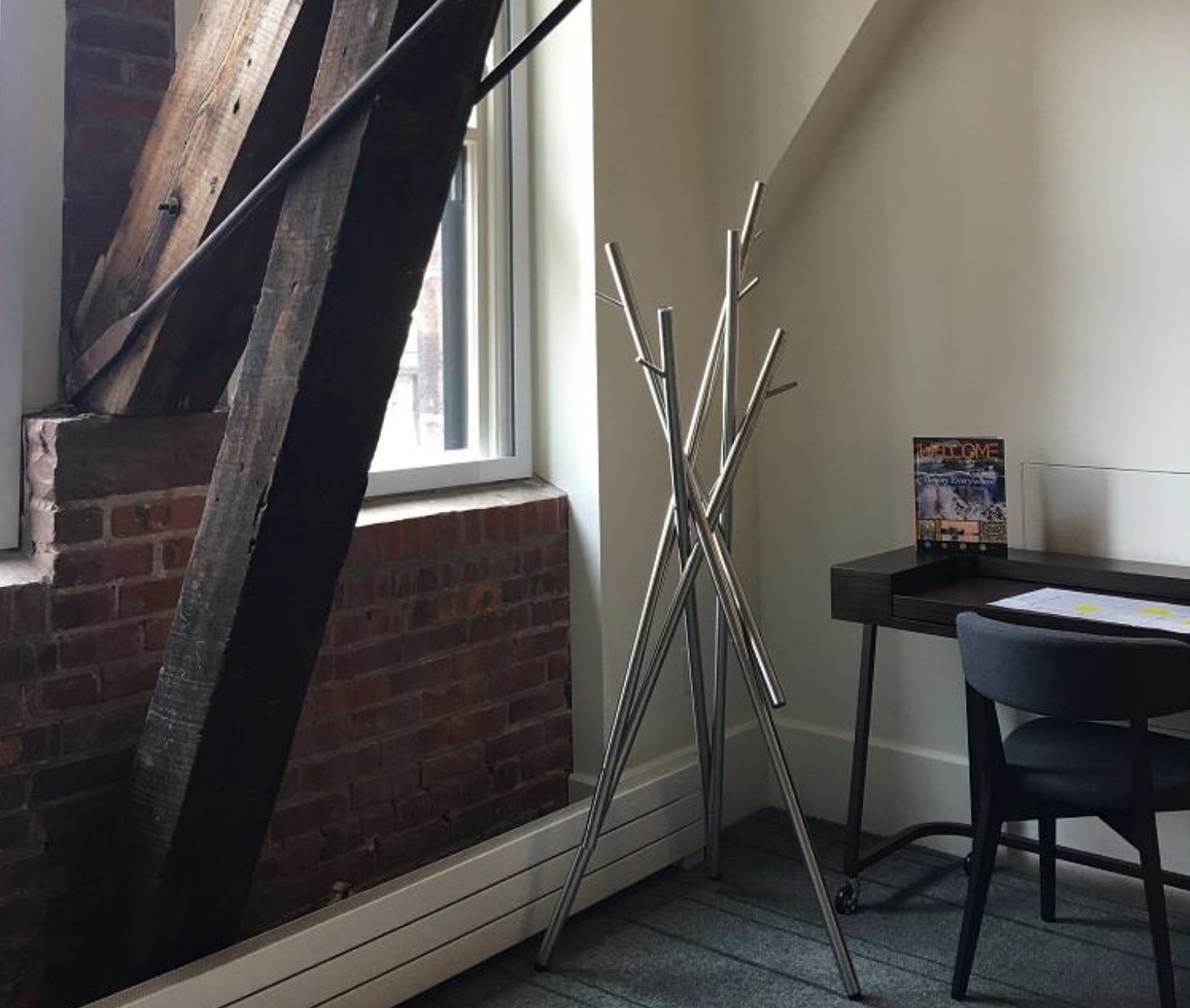 The coat rack is a combo of stainless steel sticks, that's why it's called so