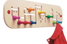 04 move the colorful pegs on this coat hook to accomodate different sized hanging items – a very whimsy idea to try